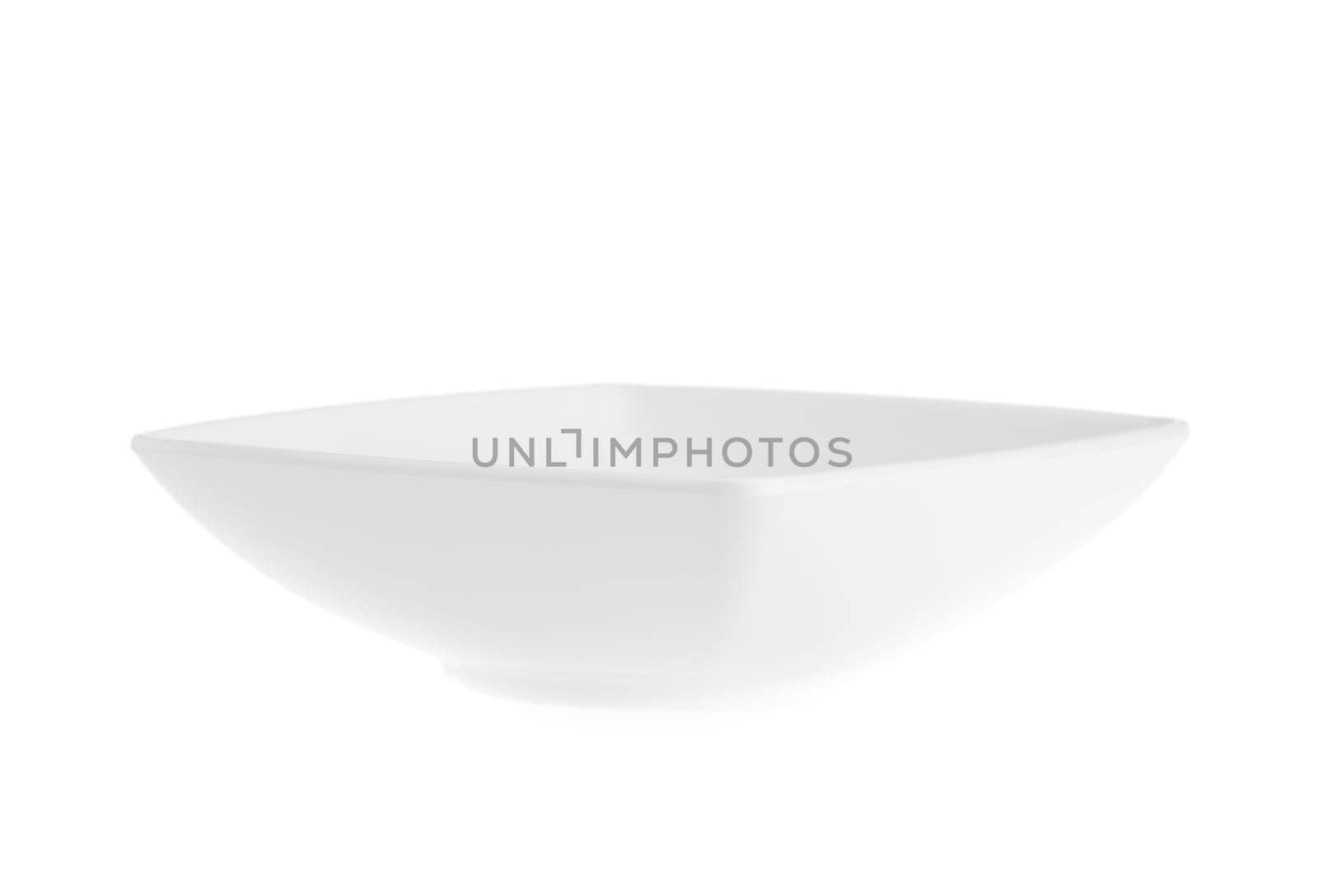 Stack of plain white dinner plates isolated on white background