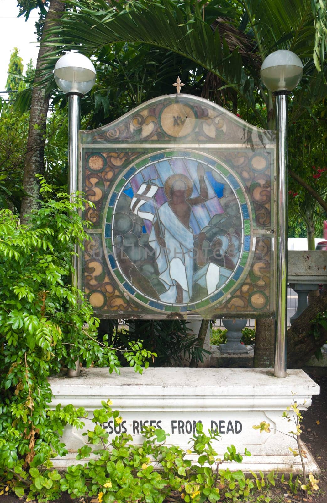 stained glass with religious text in Naga City, Philippines