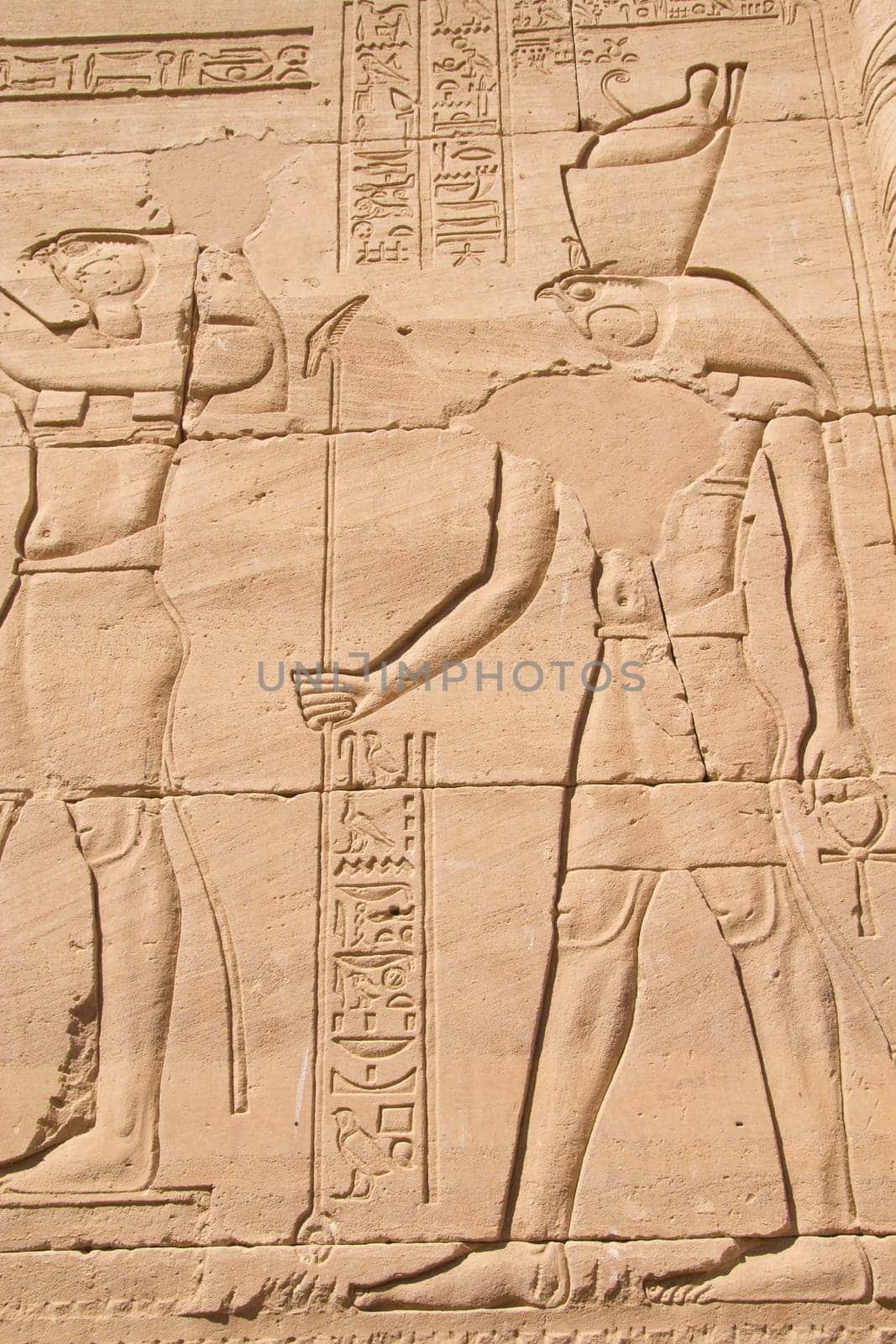 Carving of Egyptian god on pylon in Temple of Kalabsha, near Aswan (Nubia, Egypt)