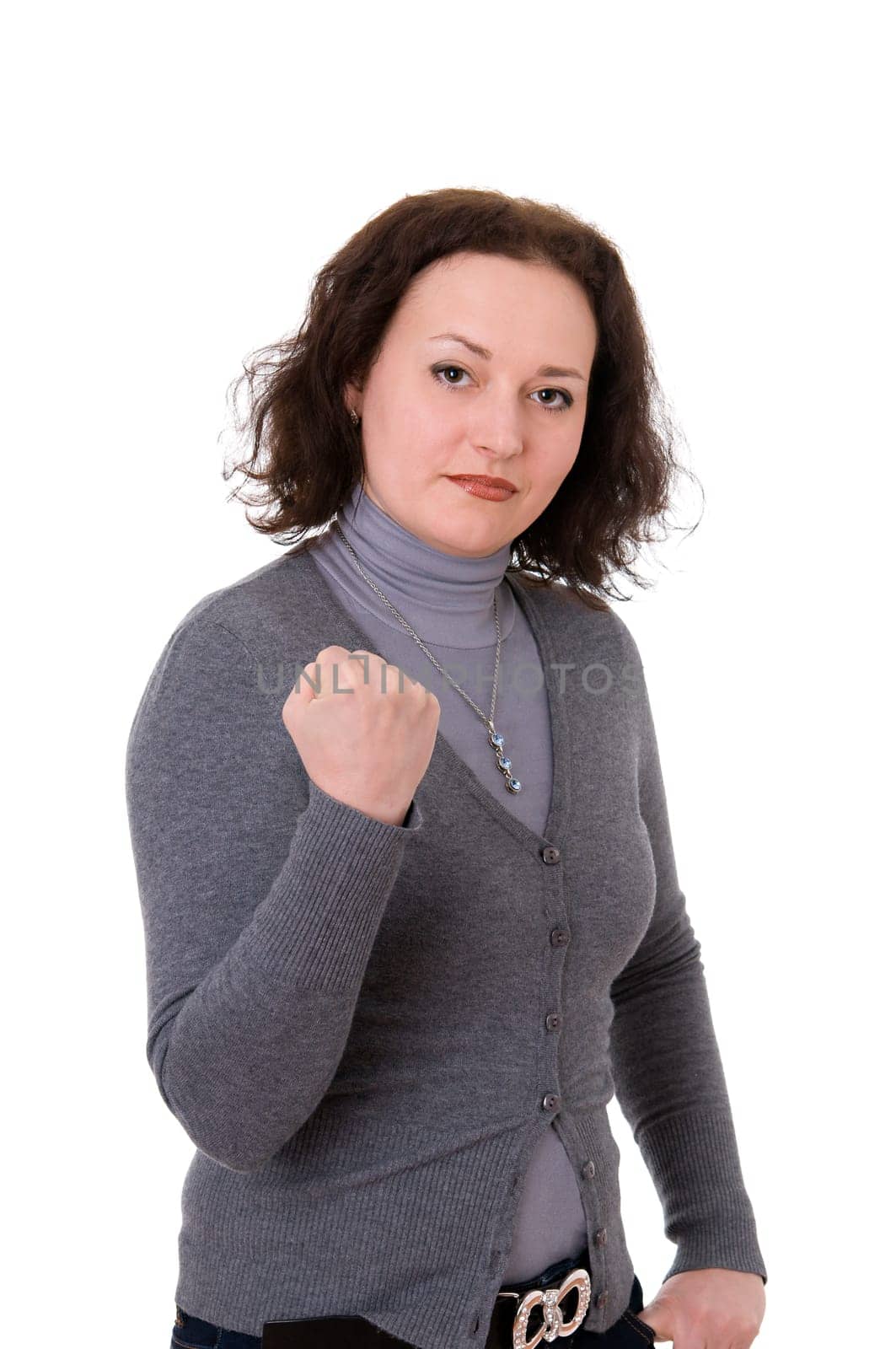 mid adult woman shows the fist  isolated on white background