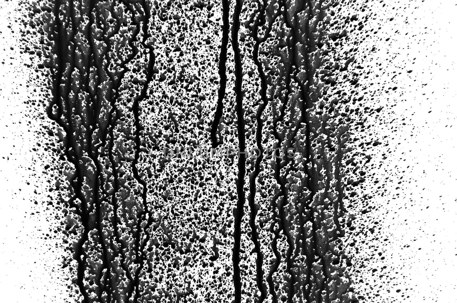 Black paint splashed over white background. Design element.