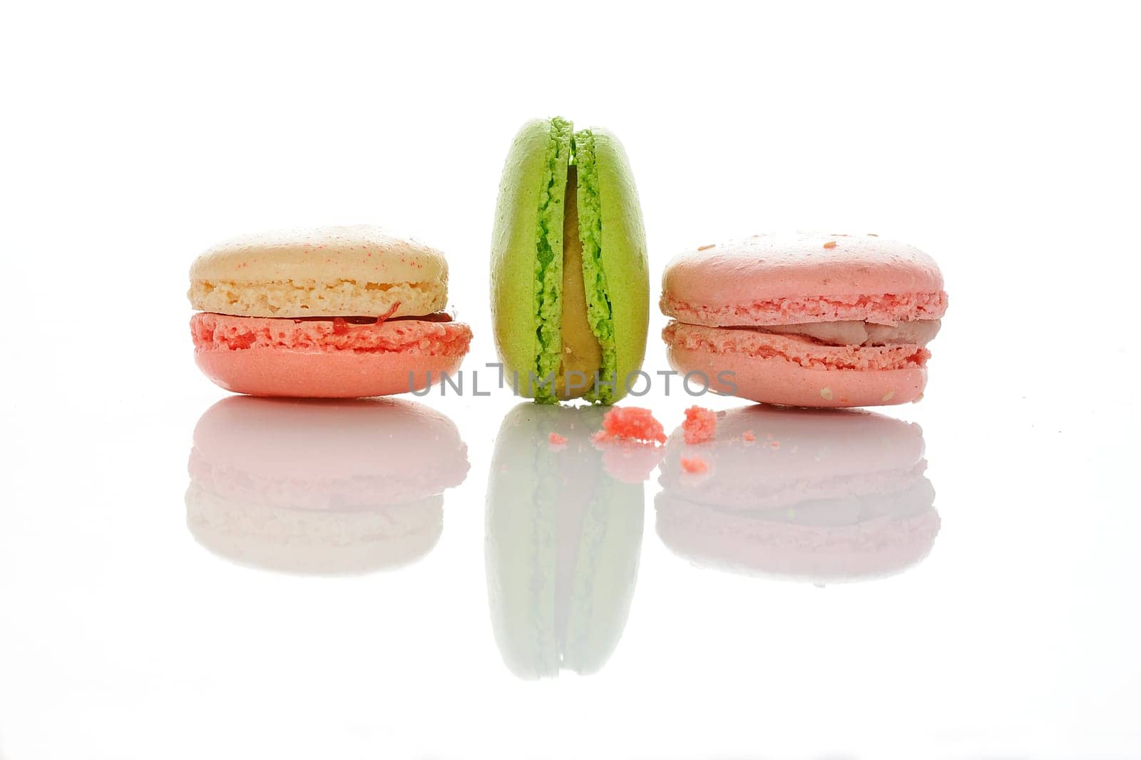Colorful macaroons on white background