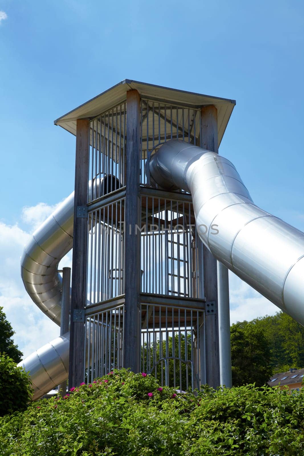 Modern tube slide made of stainless steel