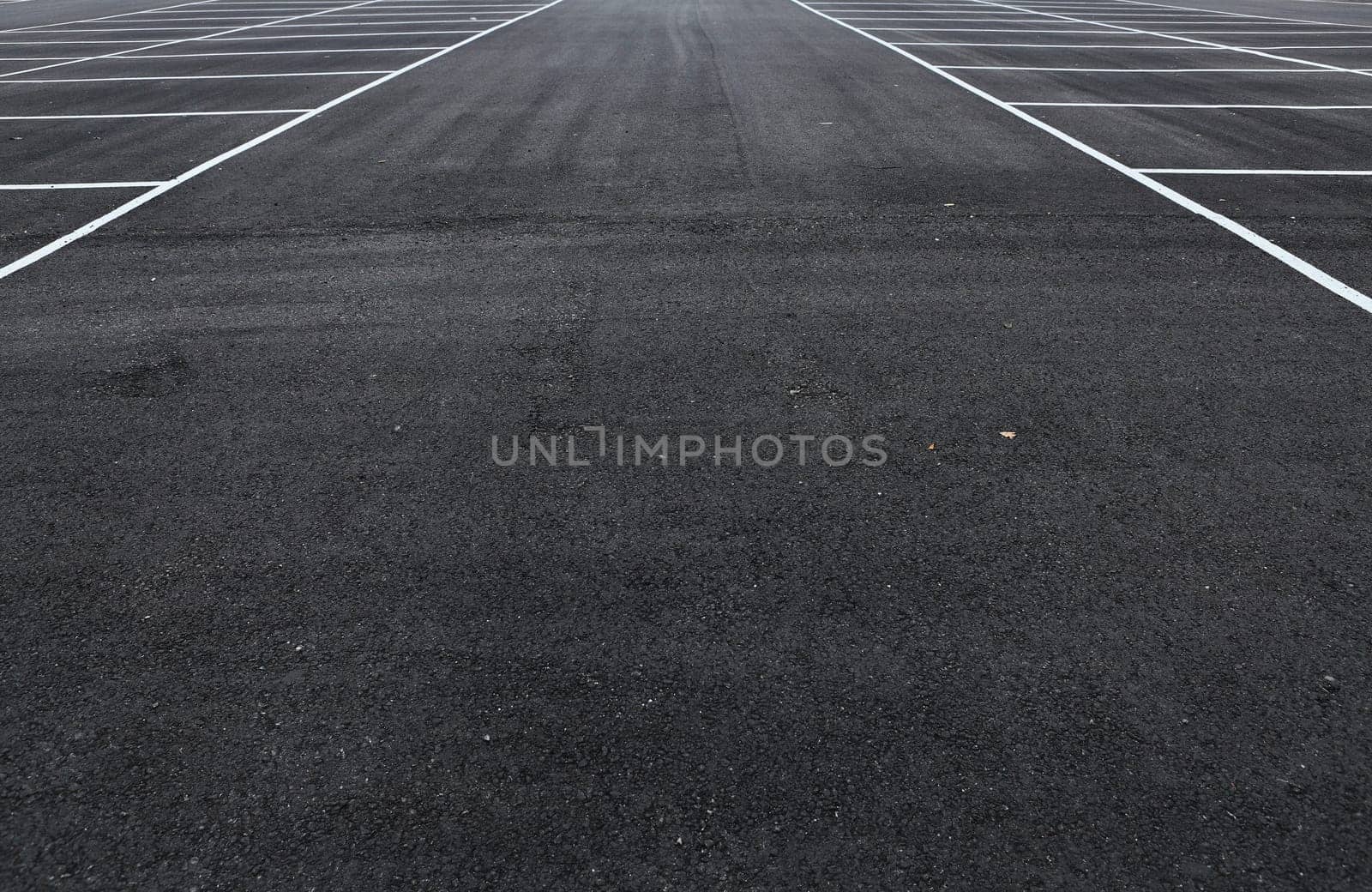 Diagonal view of a large new empty parking area
