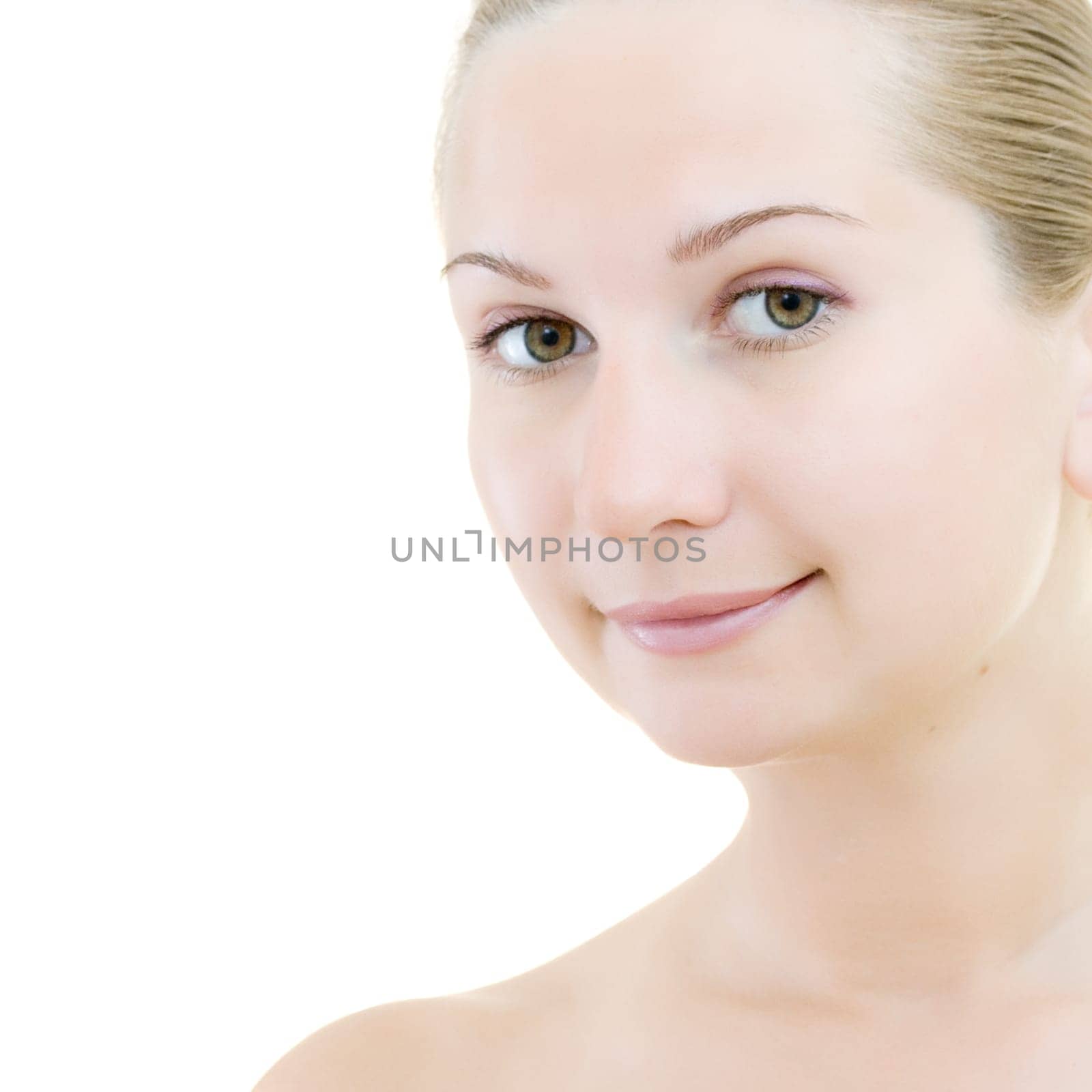 Close-up of beautiful woman face. Isolated on white background
