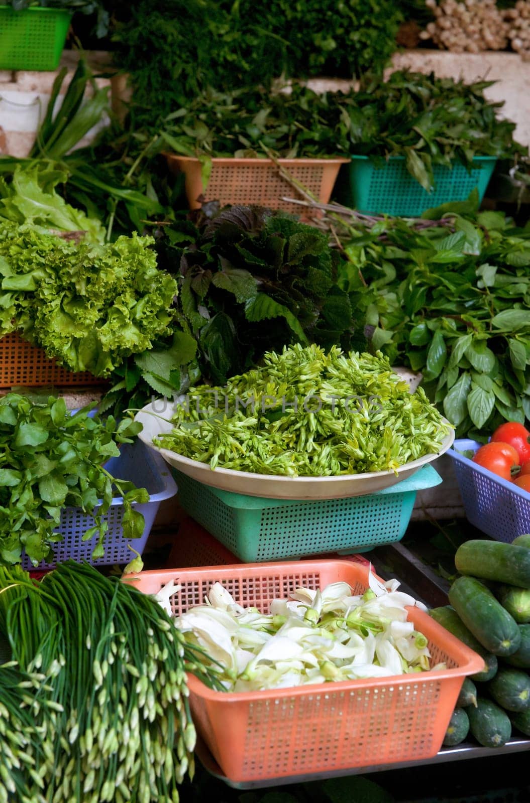 fresh fruit and vegetables for sale in this market stall
