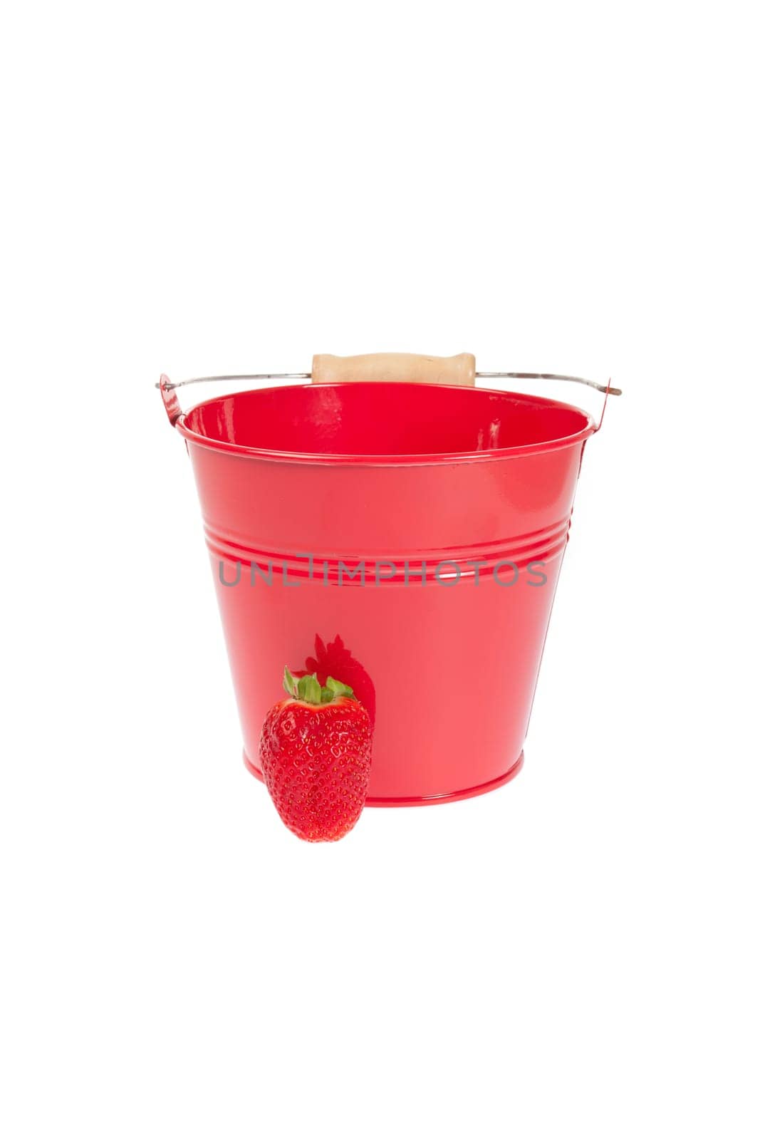 Red tin bucket with a strawberry