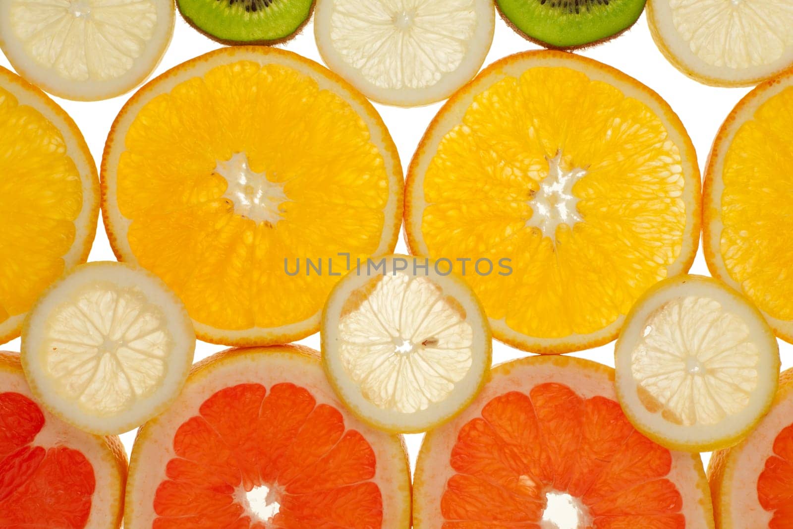 Colorful background of kiwi,grapefruit,orange and lemon slices