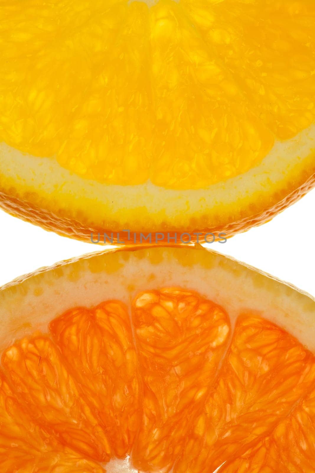 Macro shot of half an orange and blood orange