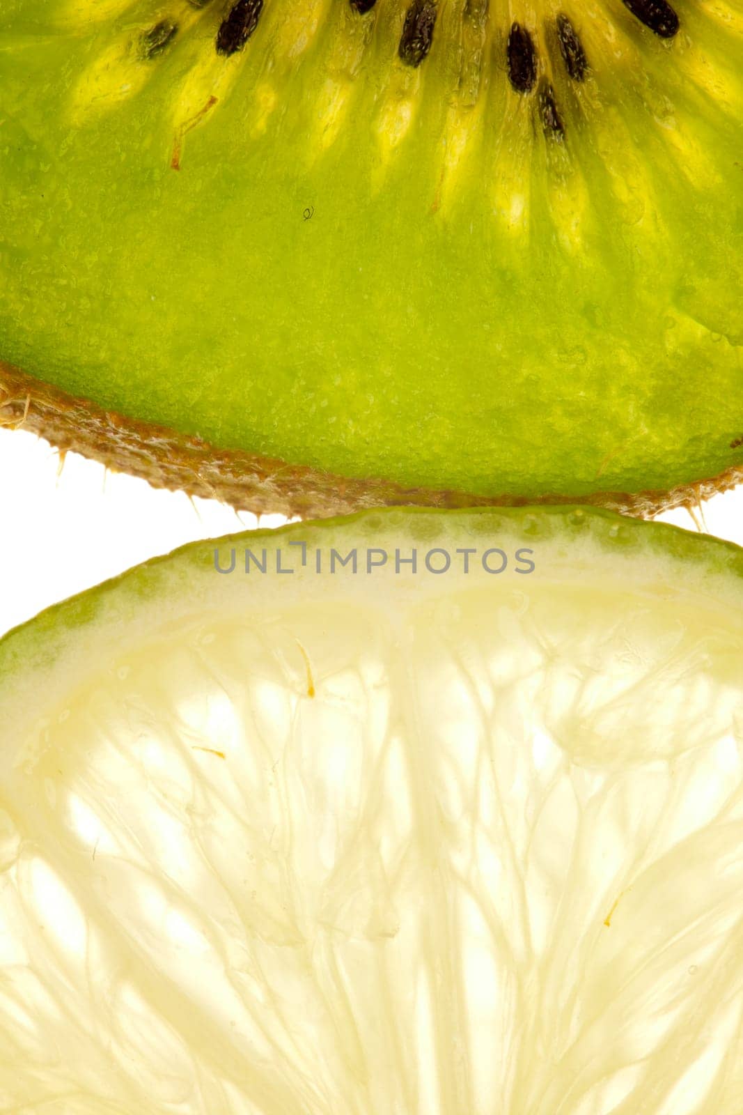 Macro shot of a kiwi and lime slice