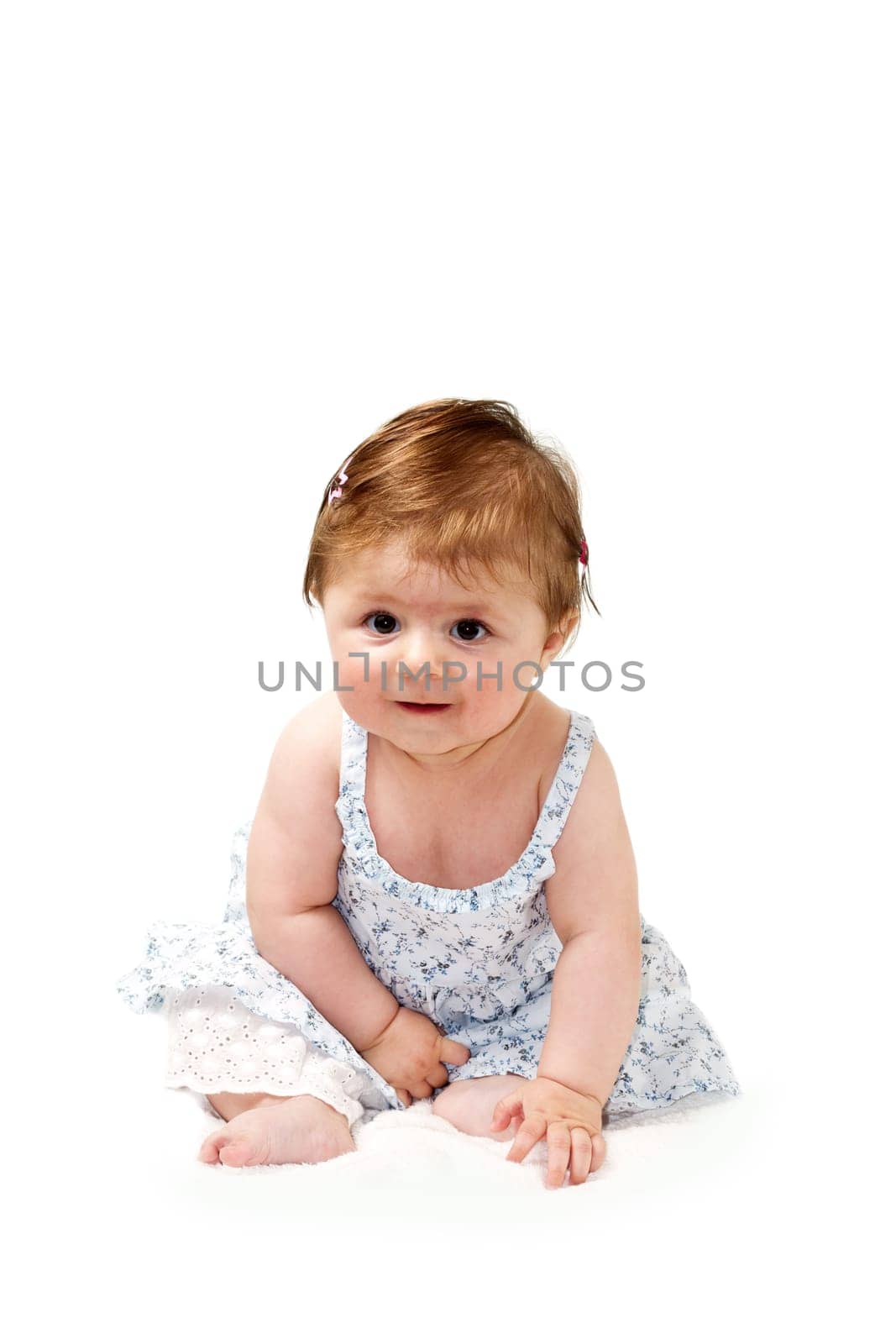 cute baby sitting and smiling