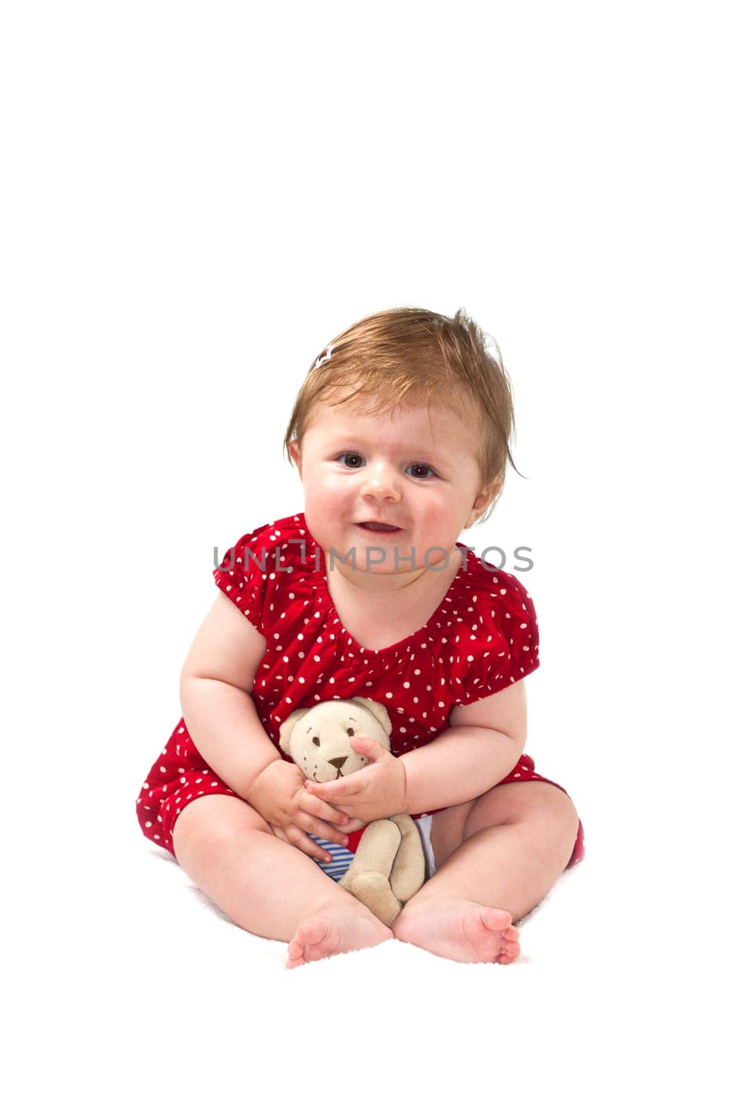 cute baby sitting and smiling