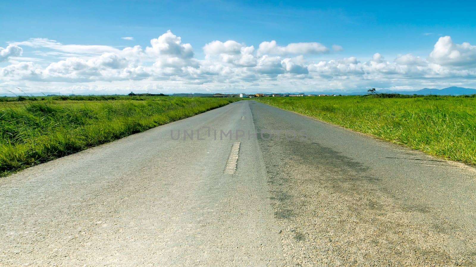 Open highway to the blue sky