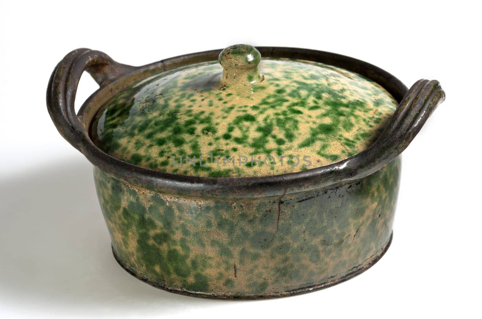 Rustic pot with lid and brown-green glaze