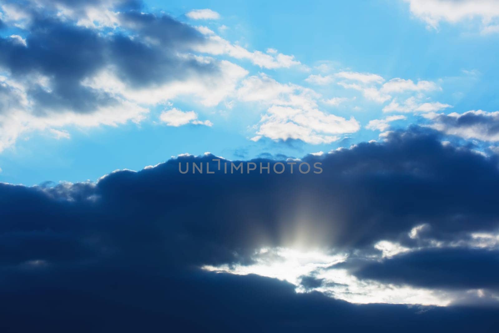 Sky with dranatic clouds and sunlight
