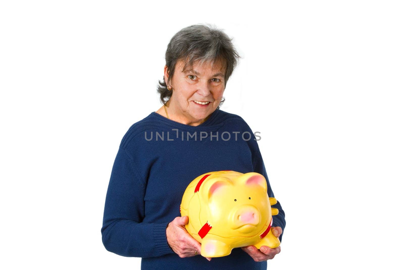 Senior woman with piggy bank - isolated on white background