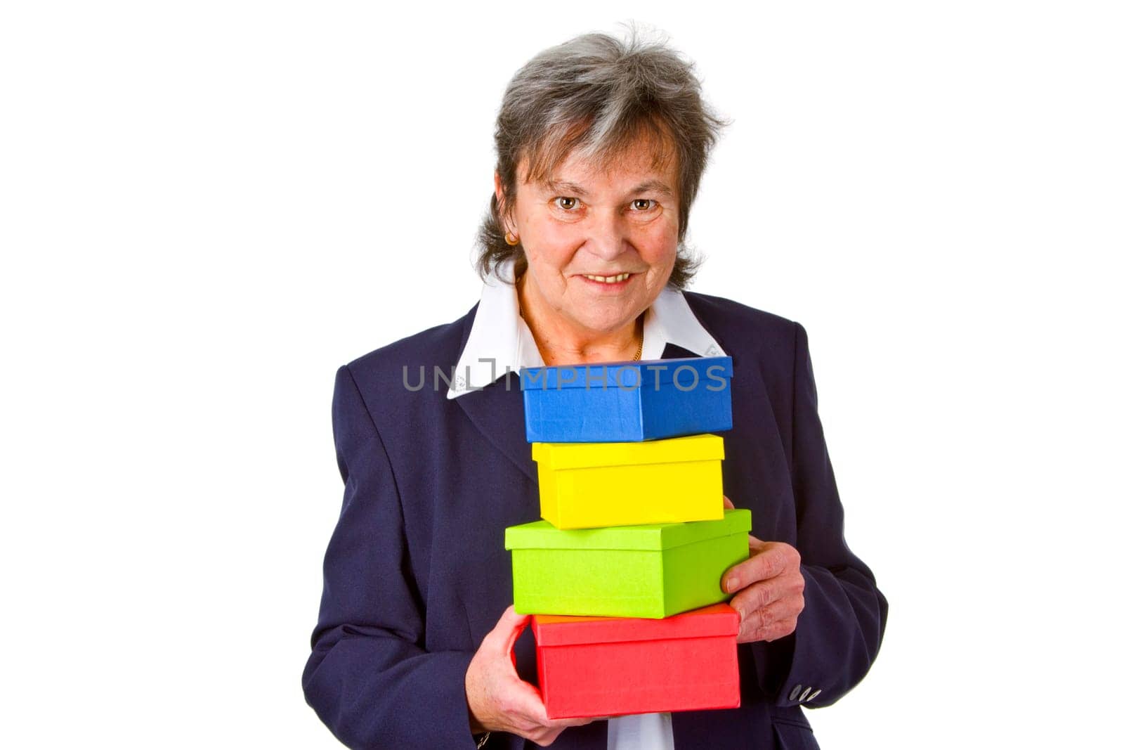 Senior woman with colorful gifts - isolated on white background