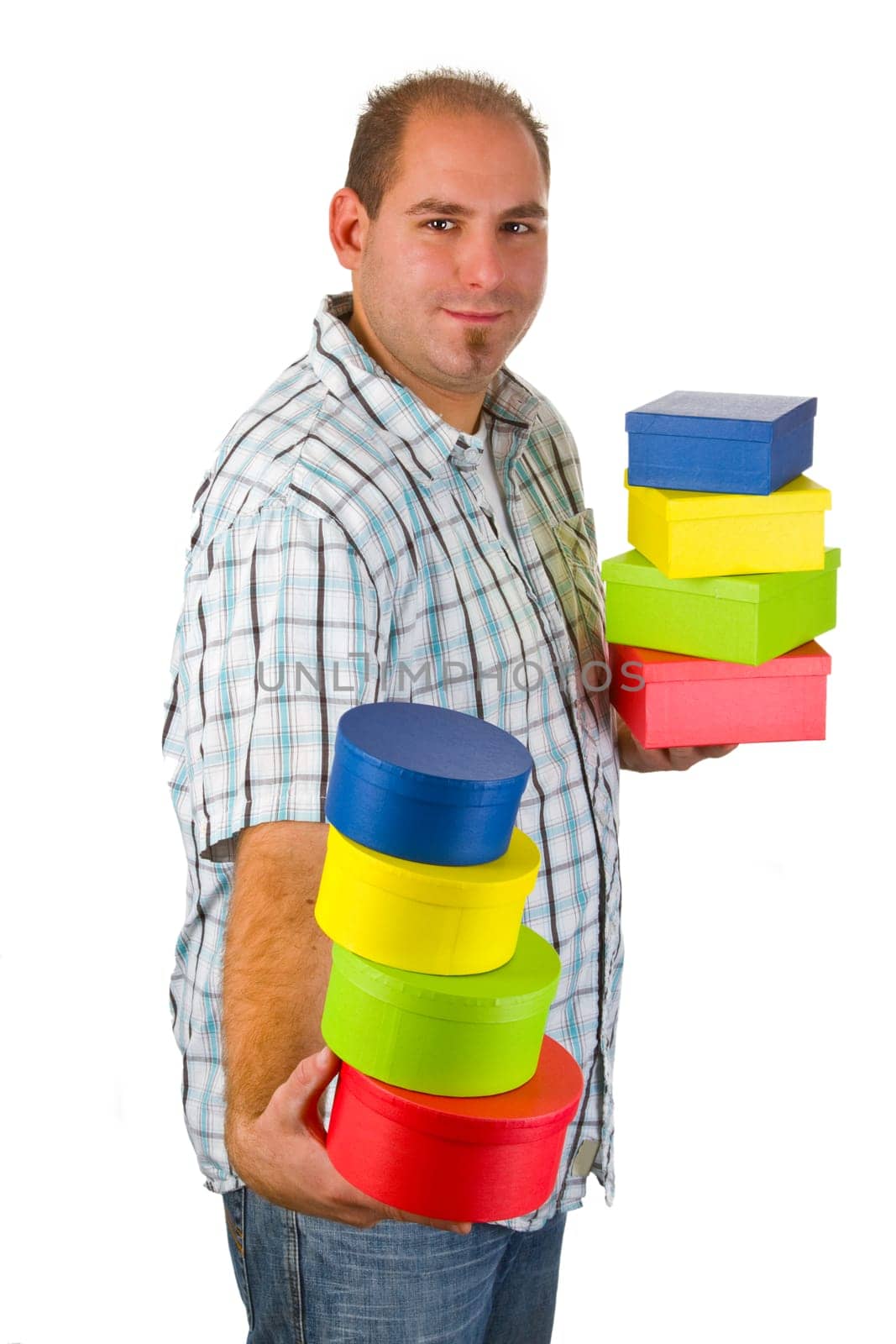 Young man with gift boxes isolated on white background