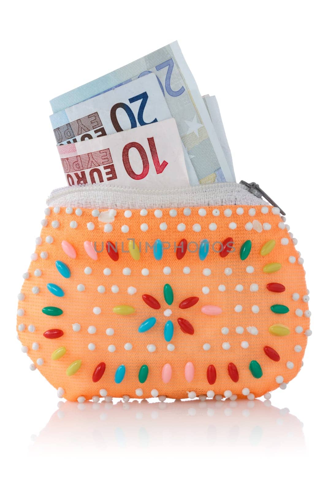 decorated wallet with euro currency over a white background