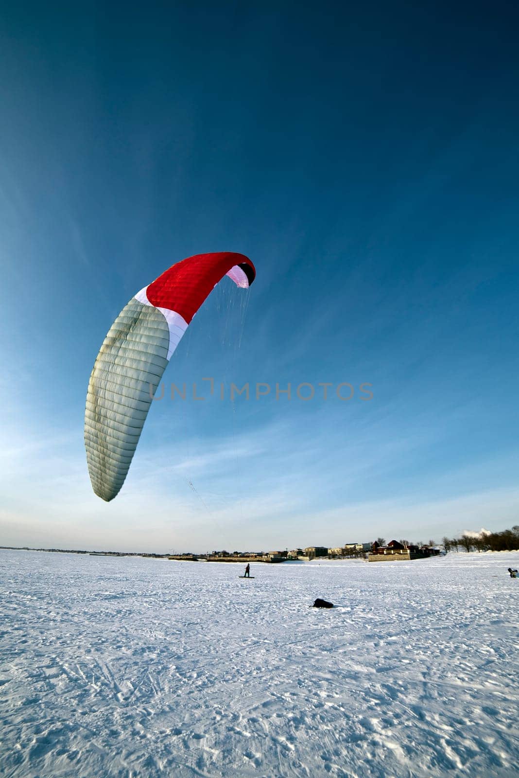 the Ski kiting on a frozen lake