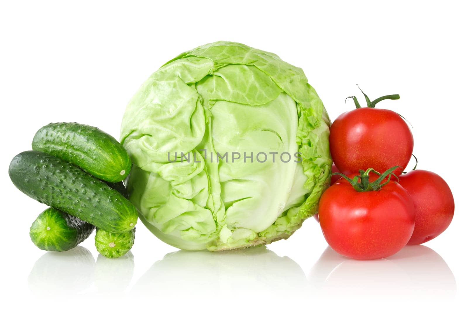 cucumbers, cabbage and tomatoes over a white background
