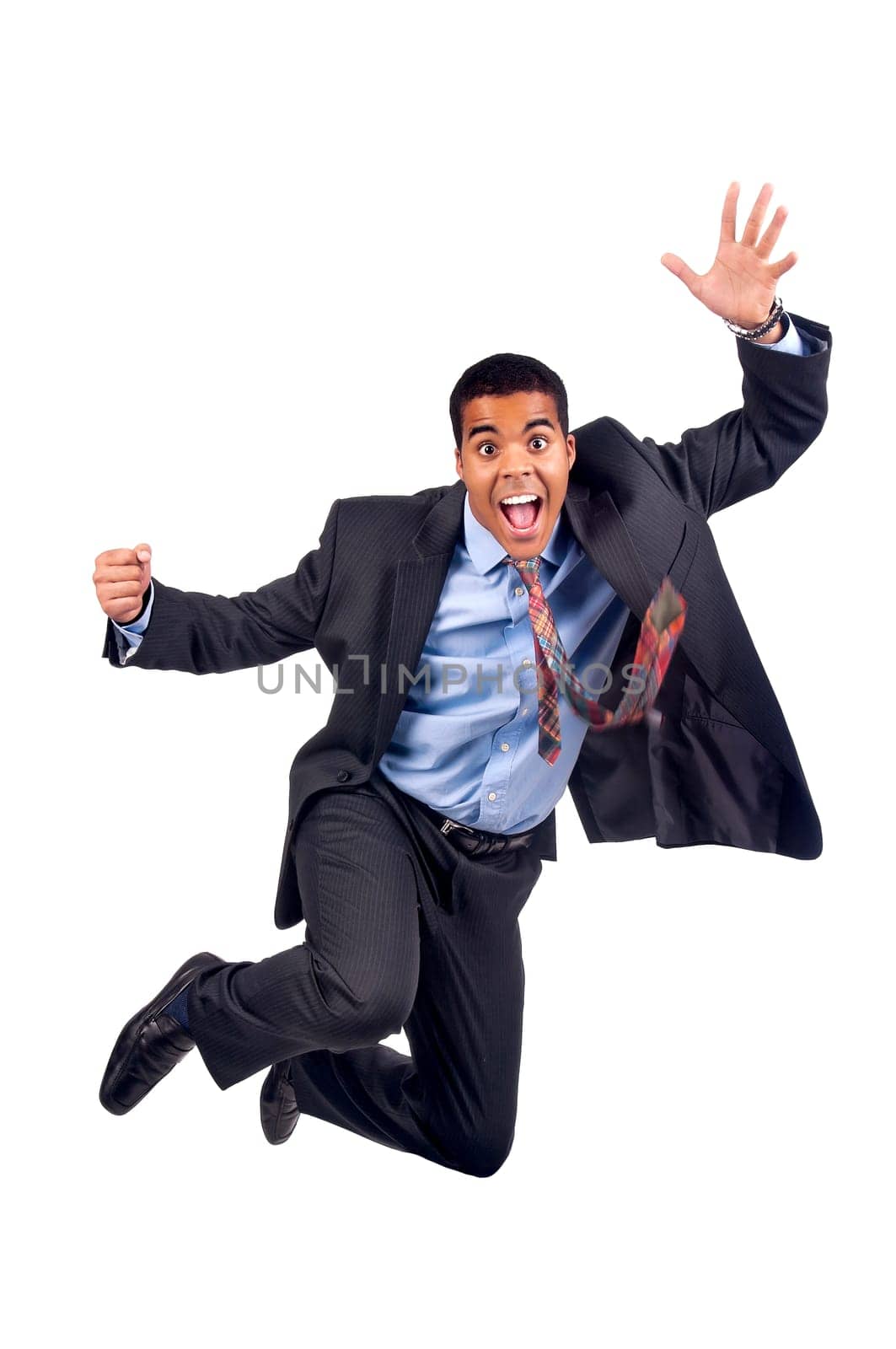 Happy businessman jumping isolated in white