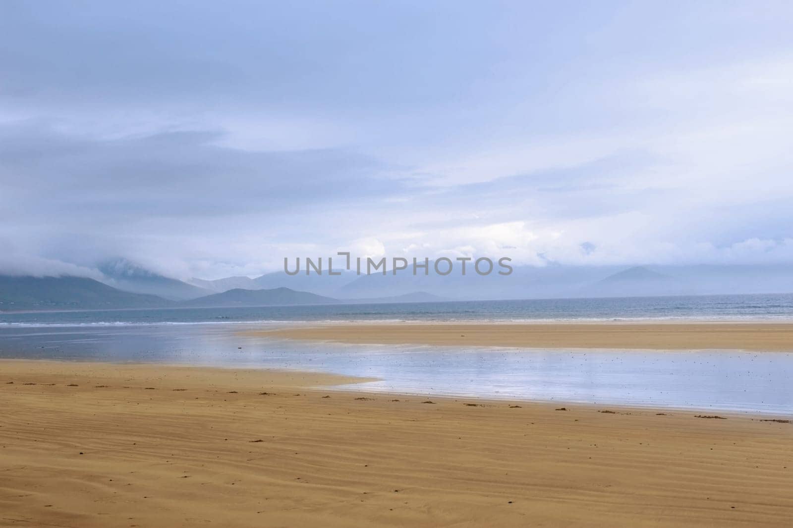 golden beach with blue sky and clouds in the maharees on the Dingle Peninsula Ireland with copy space
