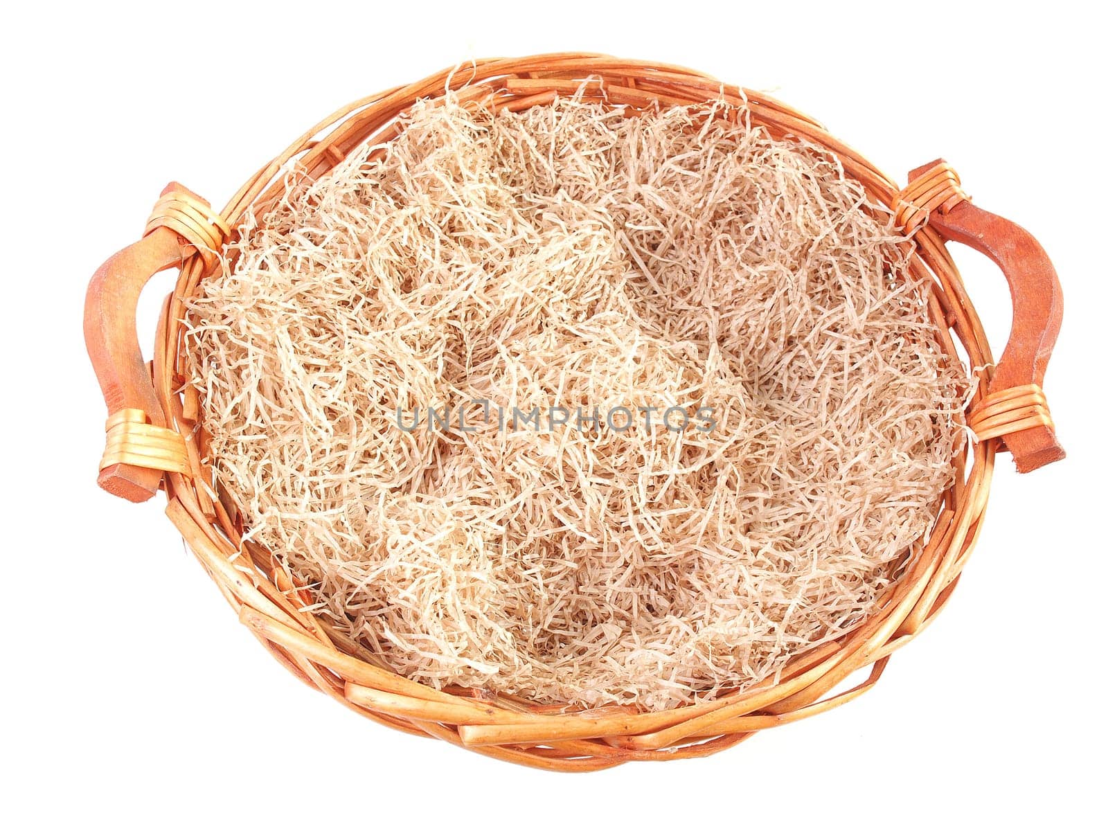 Wicker basket with straw for food such as eggs and cheese