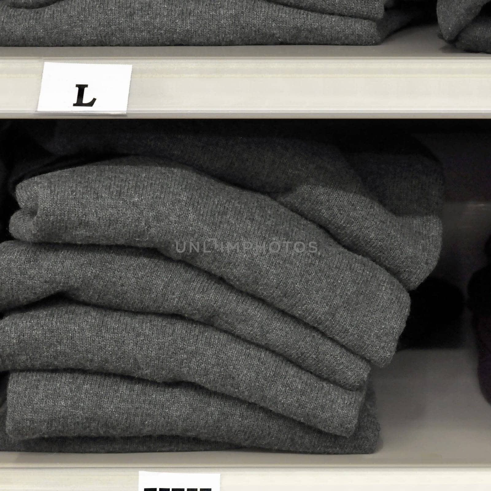 Cloths on a shelf in a department store