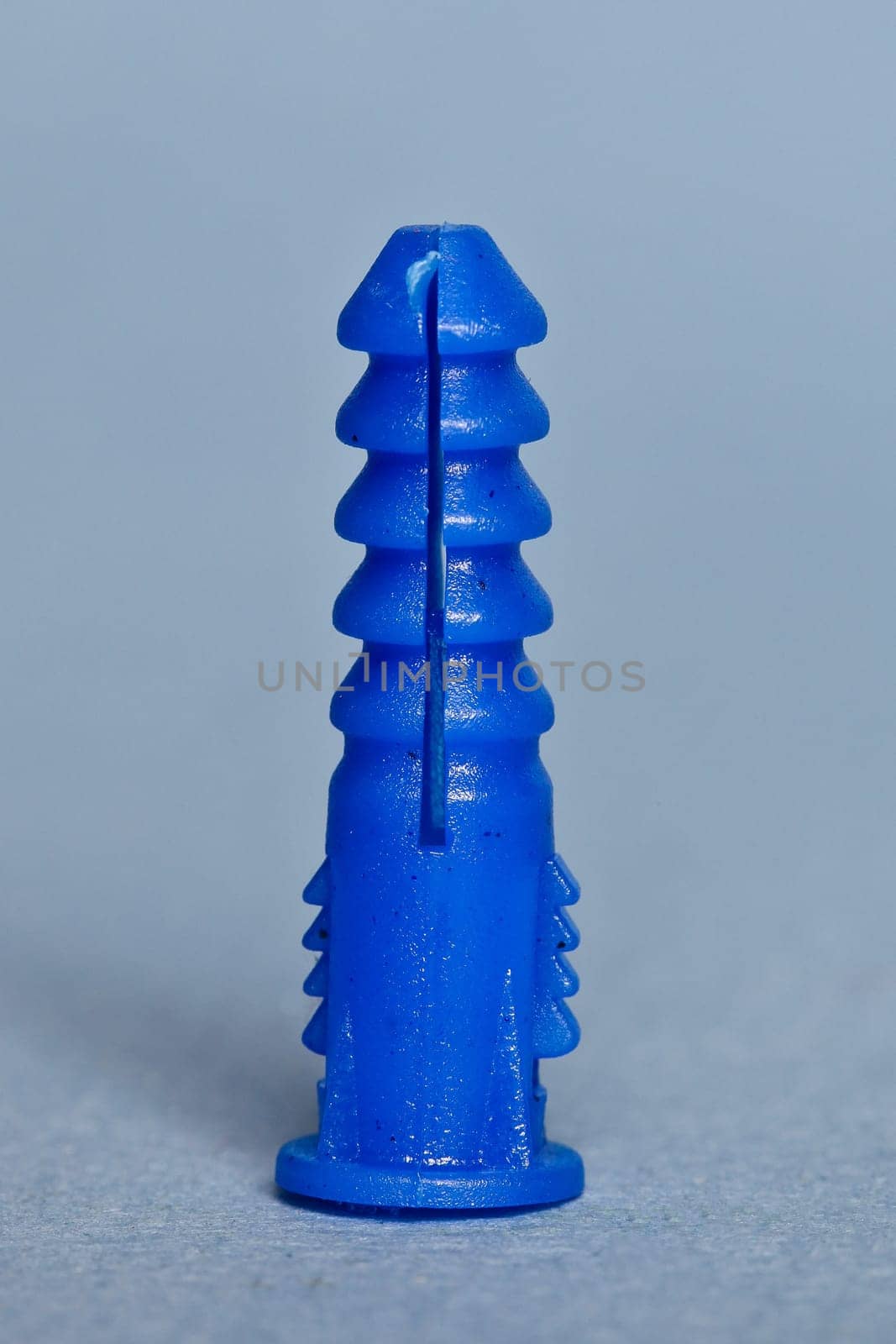 Ribbeed plastic anchor for drywall or plaster project