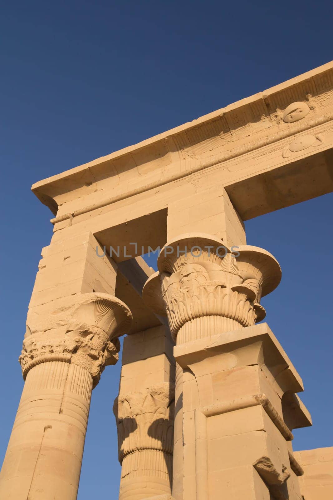 Detailed view at The Trajan Kiosk at Temple of Isis at Philae island in the sunset light. Near the town of Aswan ( Egypt)