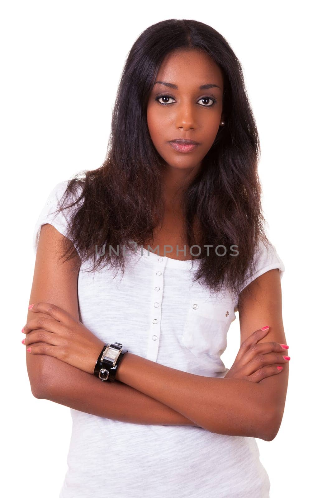 Portrait of a beautiful young black woman with folded arms isolated on white background