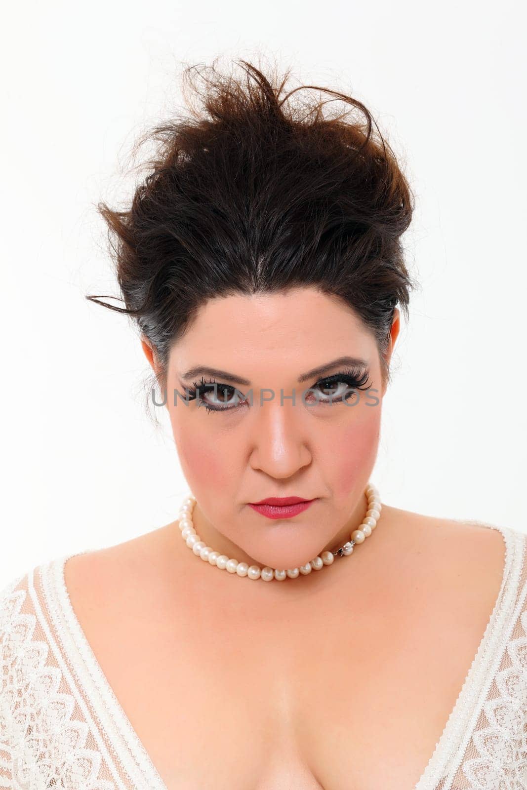 Pretty plus size woman with white dress