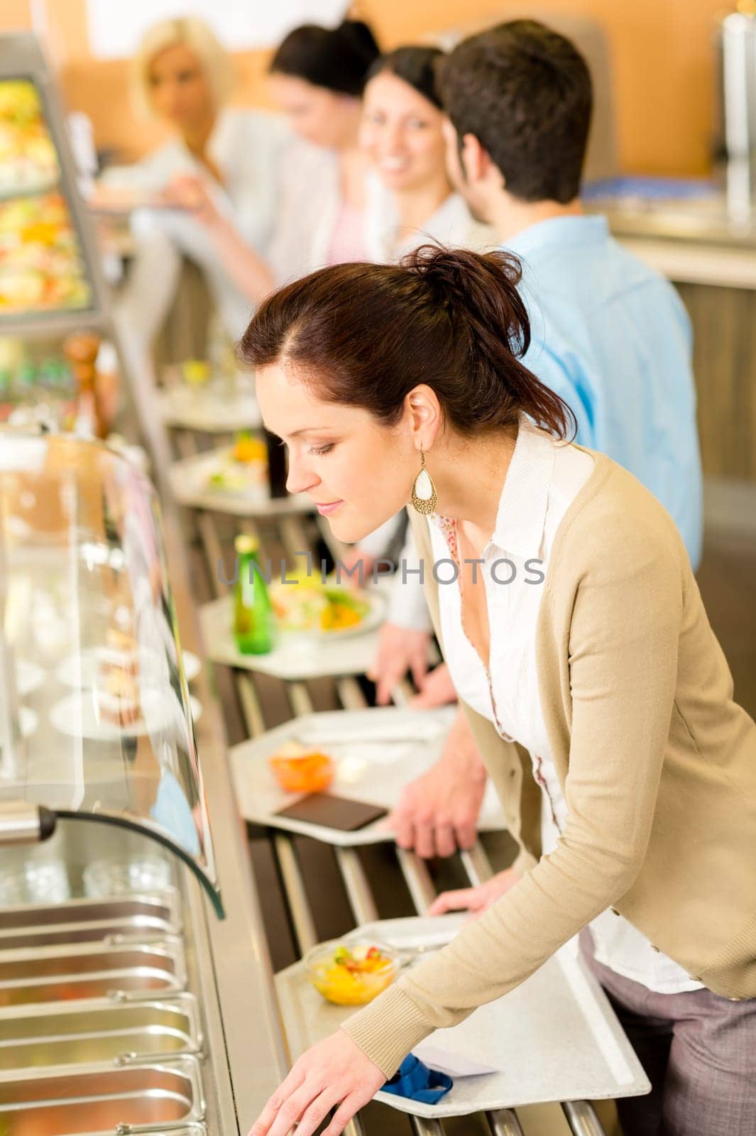 Business woman choose cafeteria lunch buffet carry serving tray