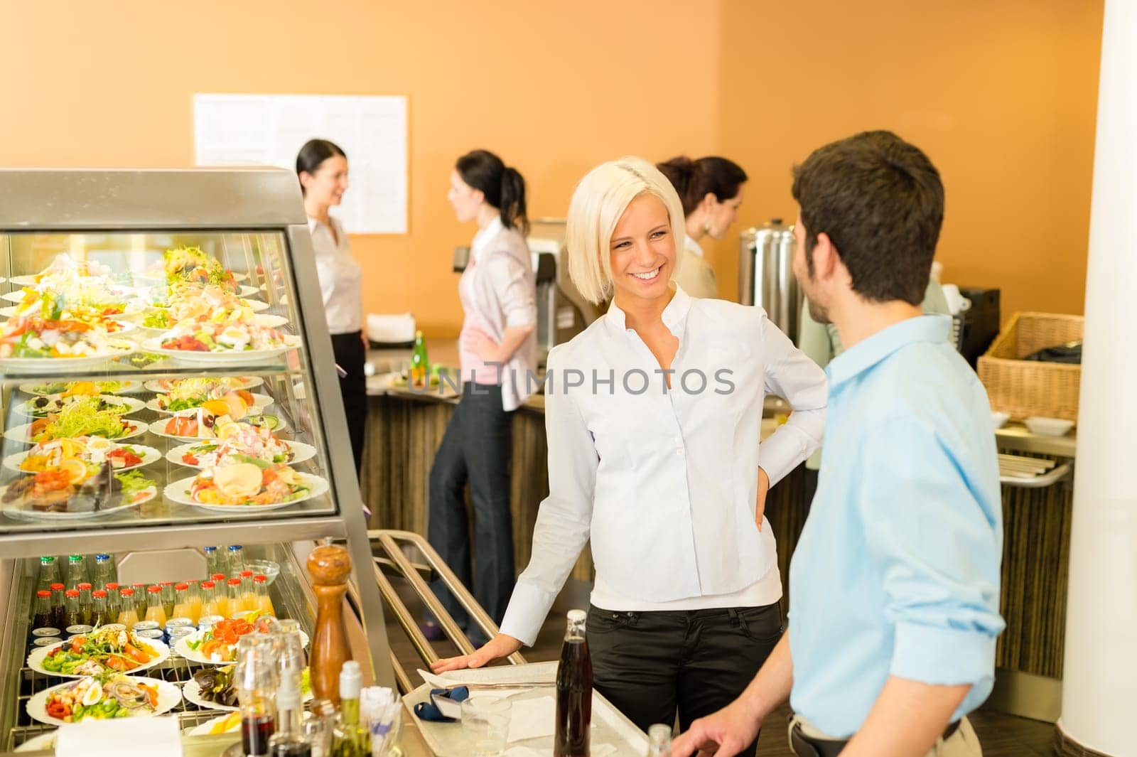 Office people at cafeteria chatting hold serving tray canteen self-service