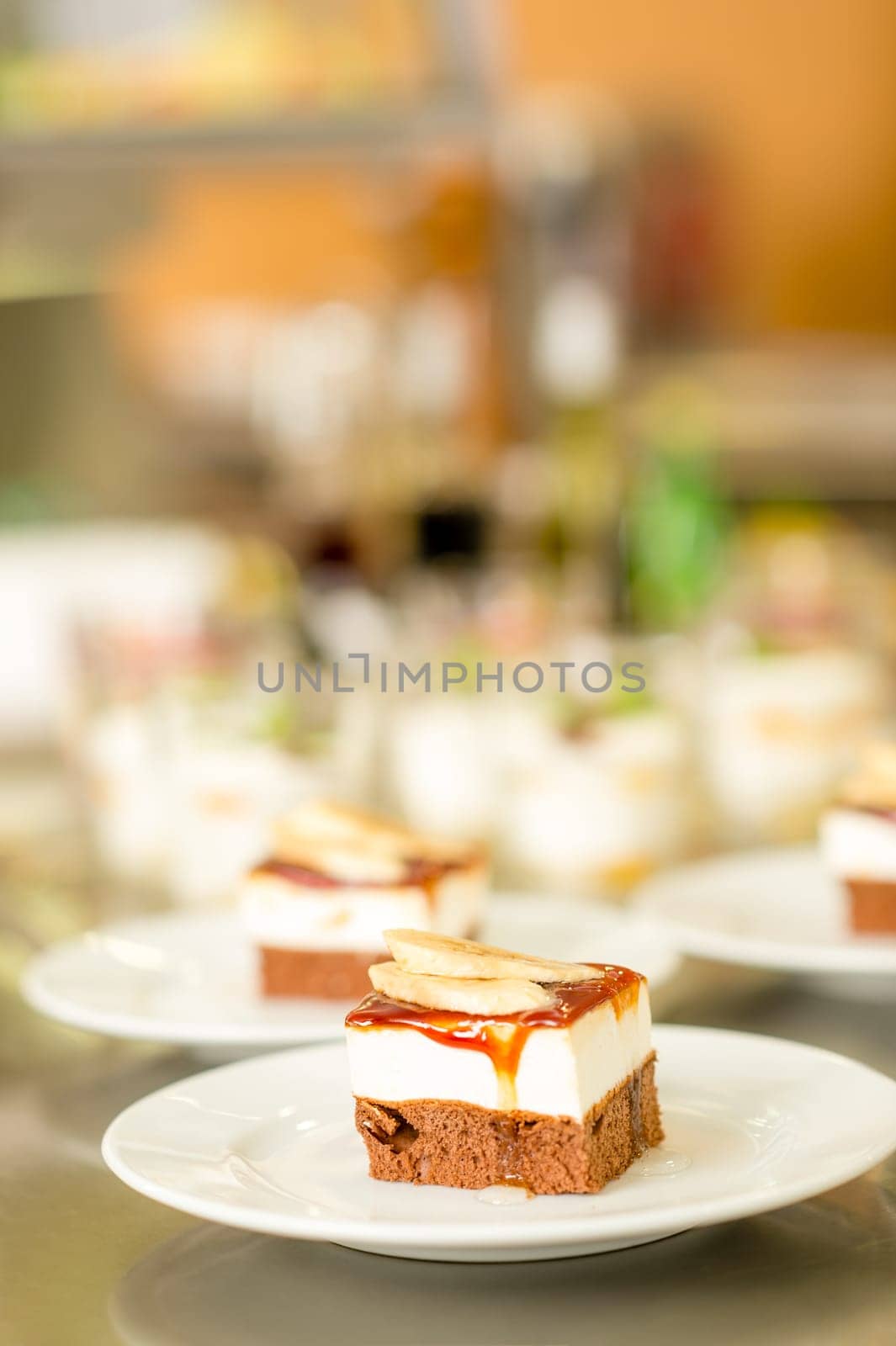 Banana dessert on white plate in cafeteria canteen delicious cake