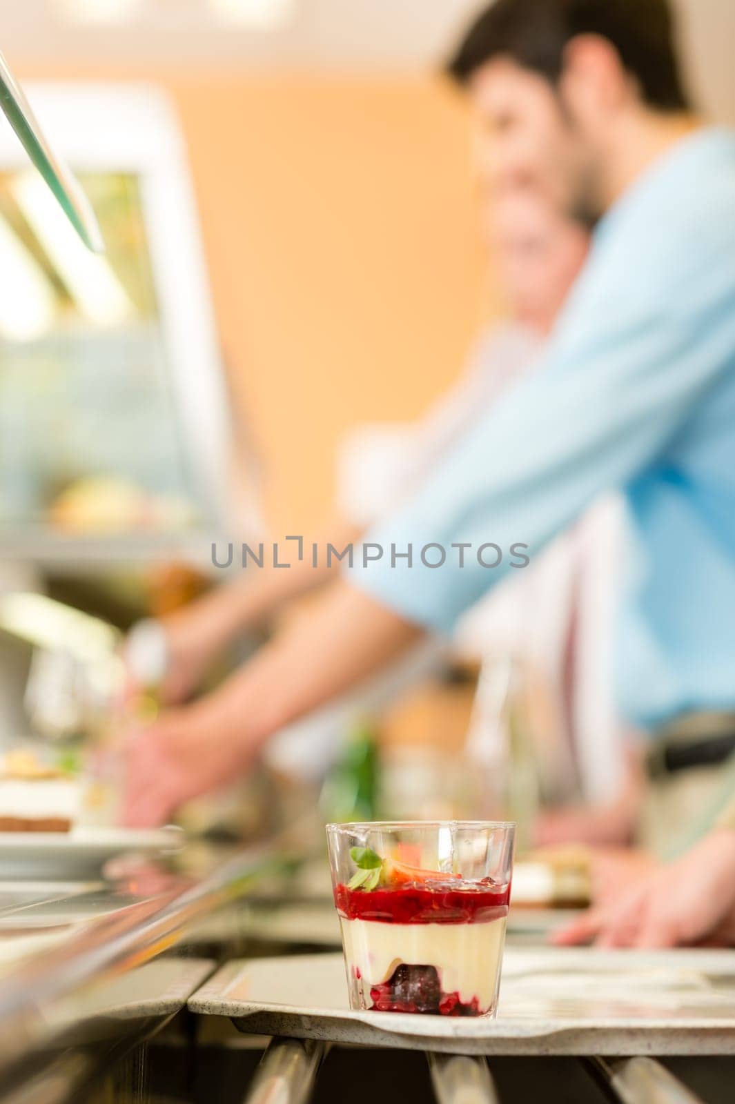 Forest fruit dessert on serving tray cafeteria delicatessen
