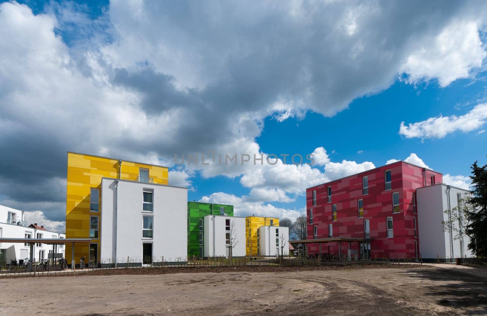 colorful new apartments under a nice cloudy sky