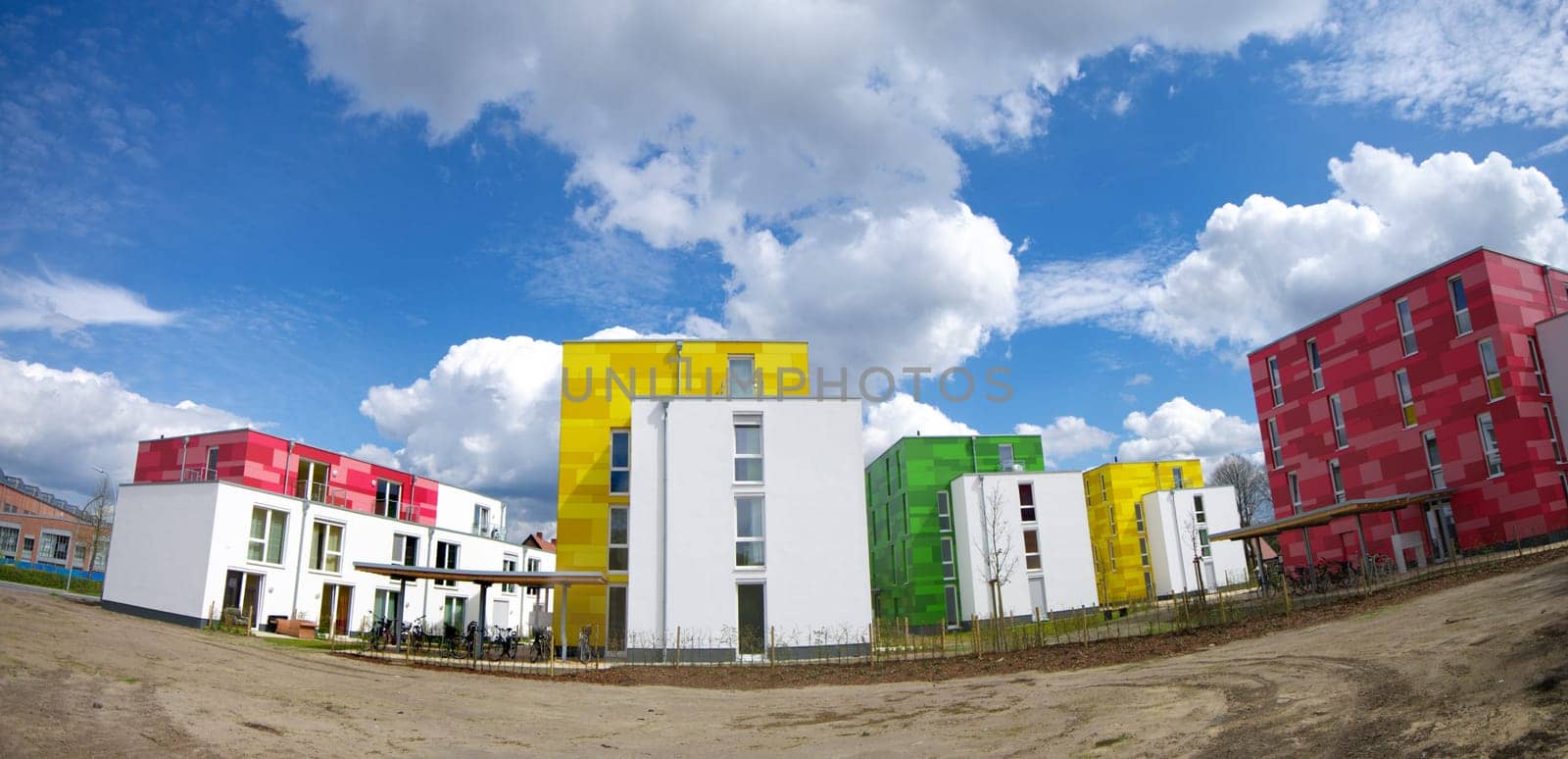 colorful new apartments under a nice cloudy sky