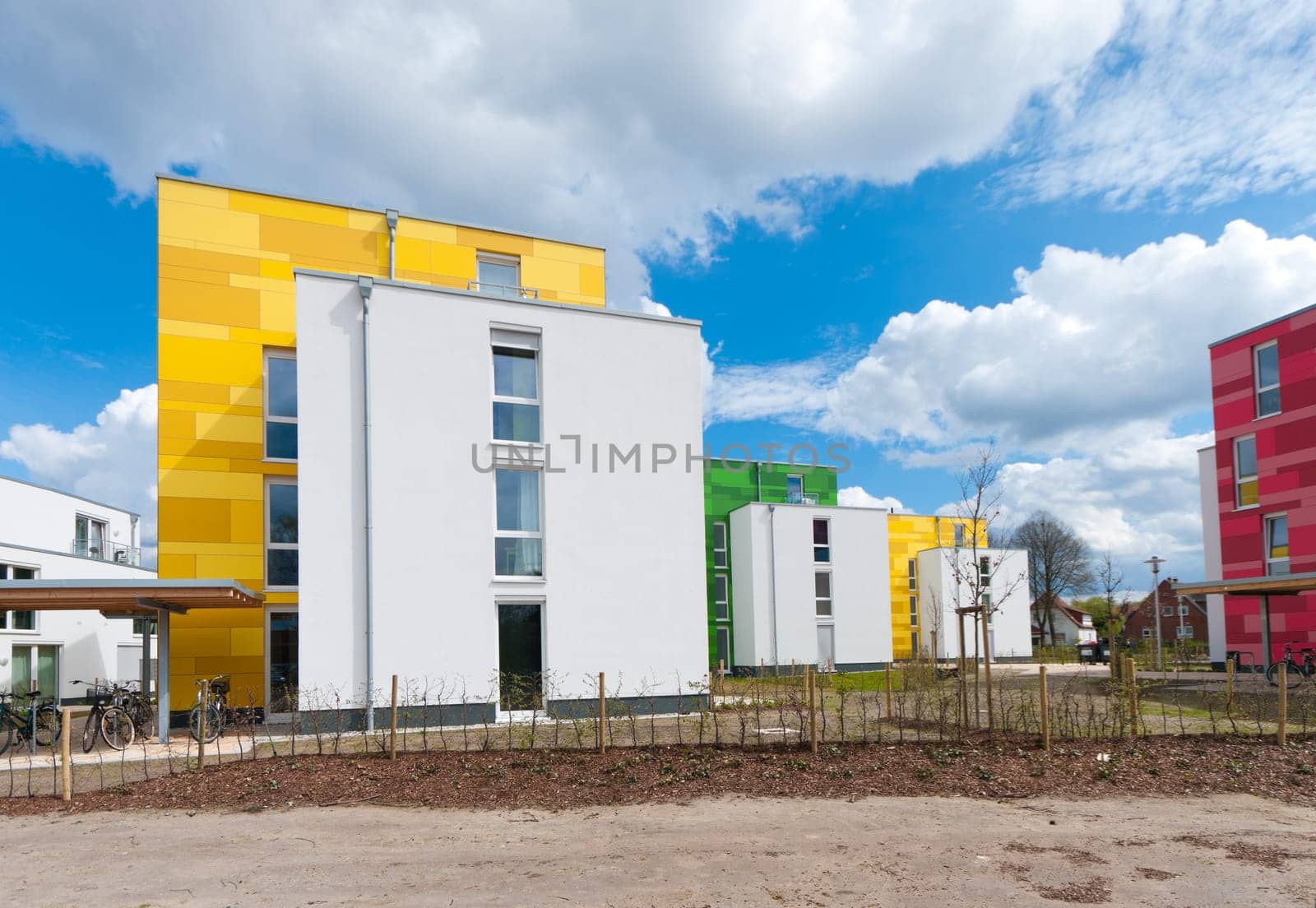 colorful new apartments under a nice cloudy sky