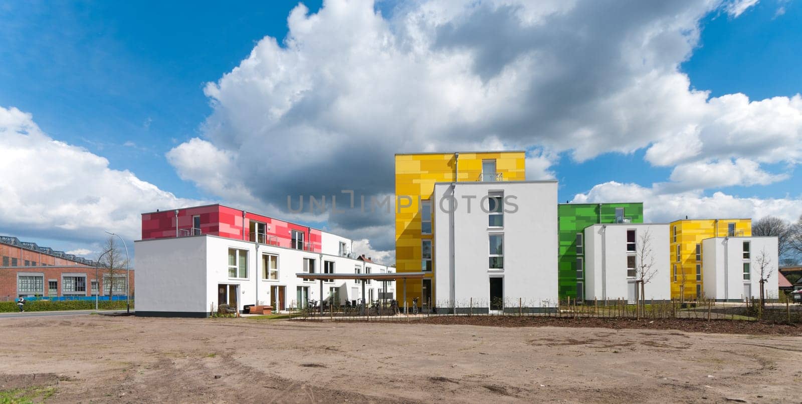 colorful new apartments under a nice cloudy sky