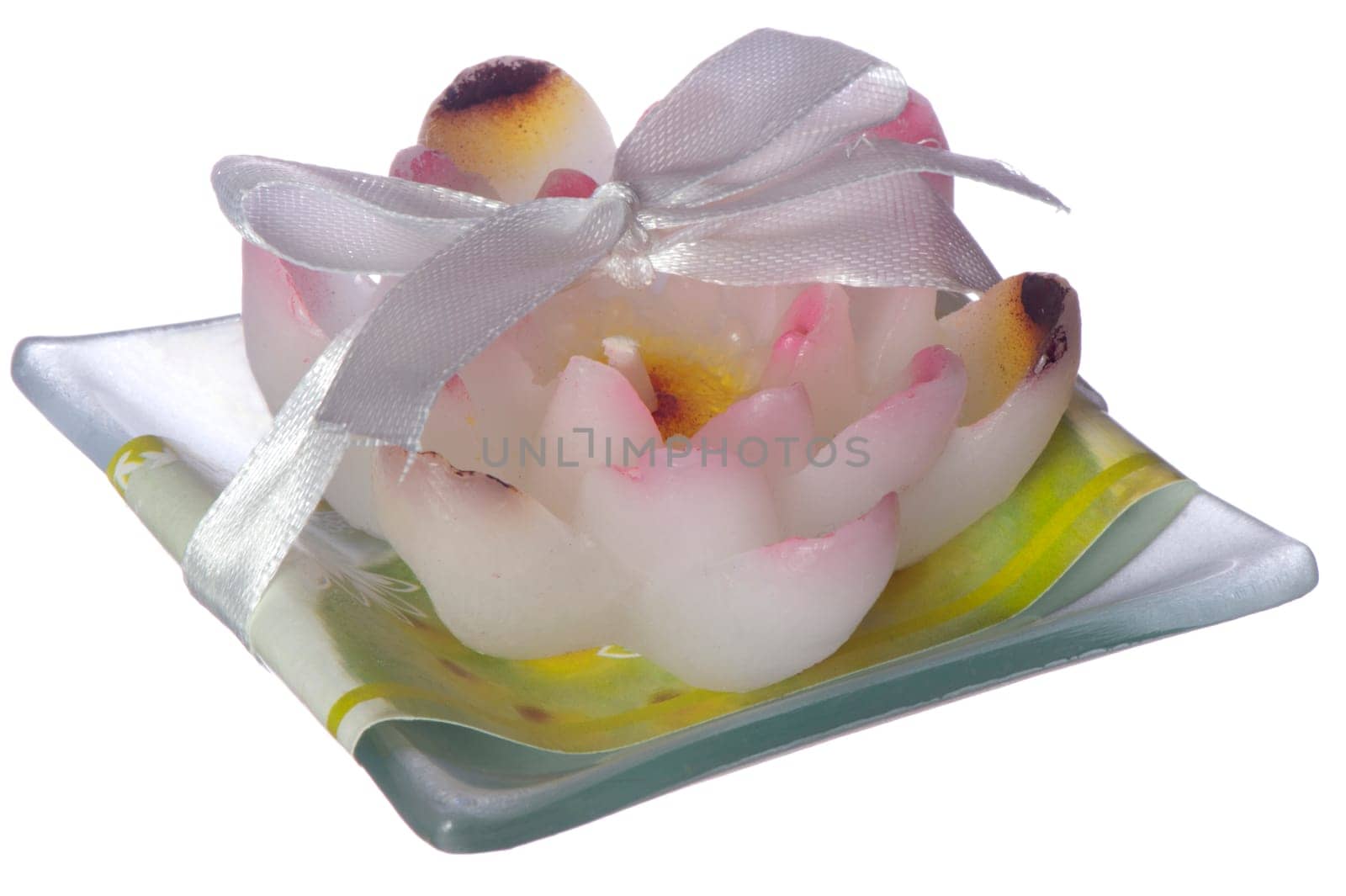a scented candle on a white background