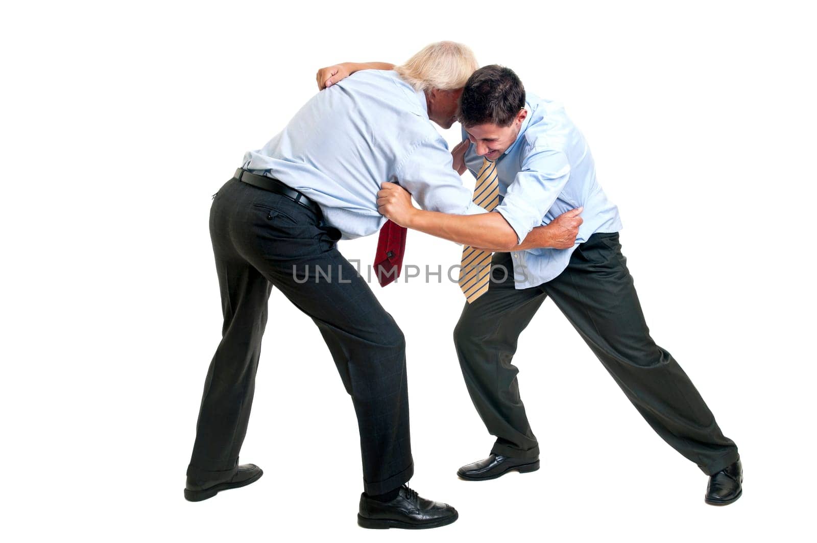 To businessmen wrestling isolated against a white background