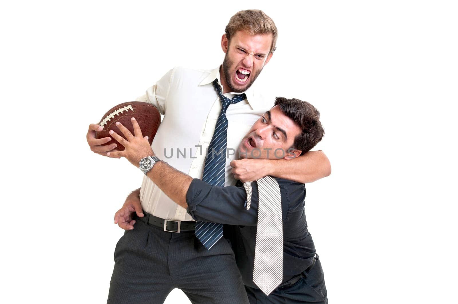 Businessmen playing rugby isolated in white