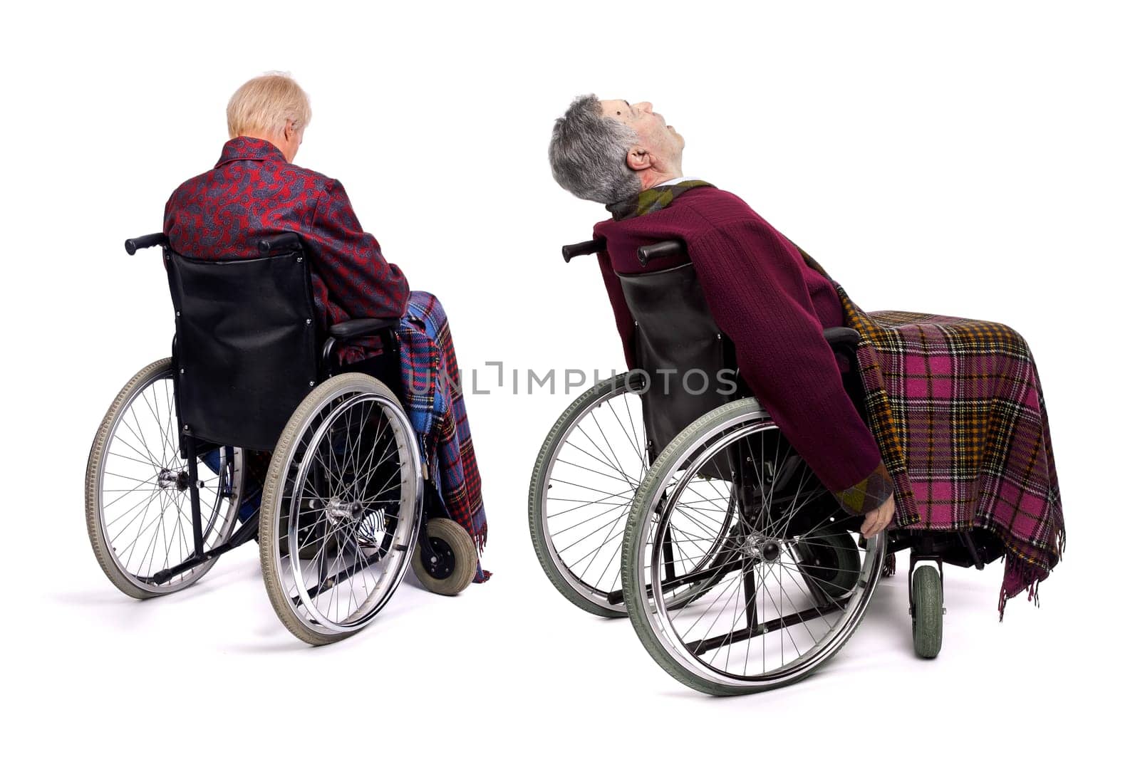 Lonely male elderlies in wheelchairs
