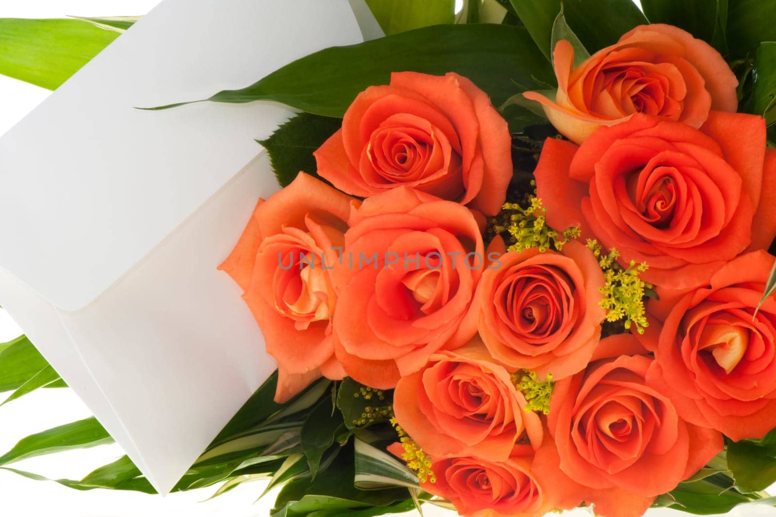 Bouquet of orange roses and ticket on a white background