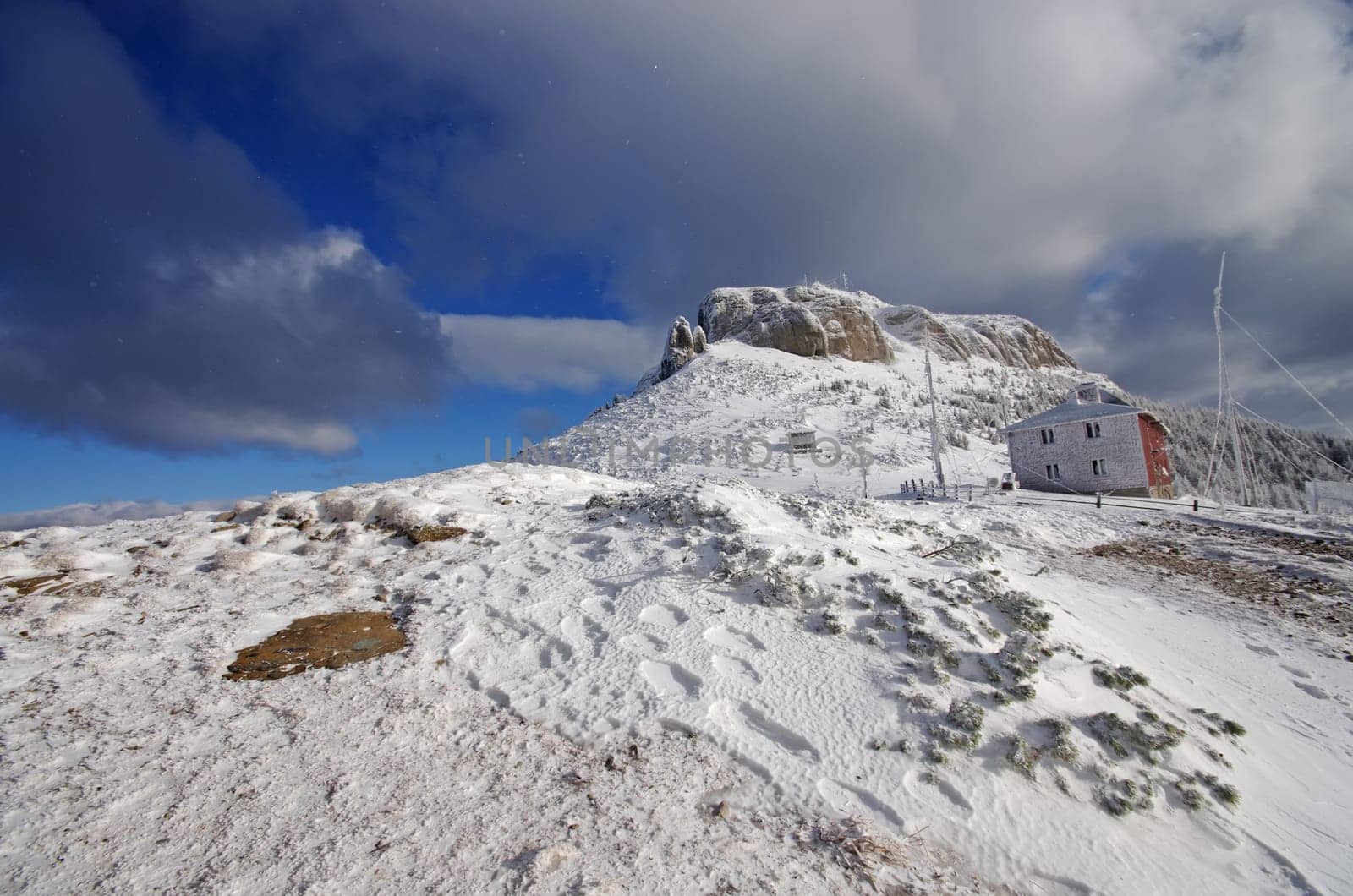 Chalet in winter on mountain