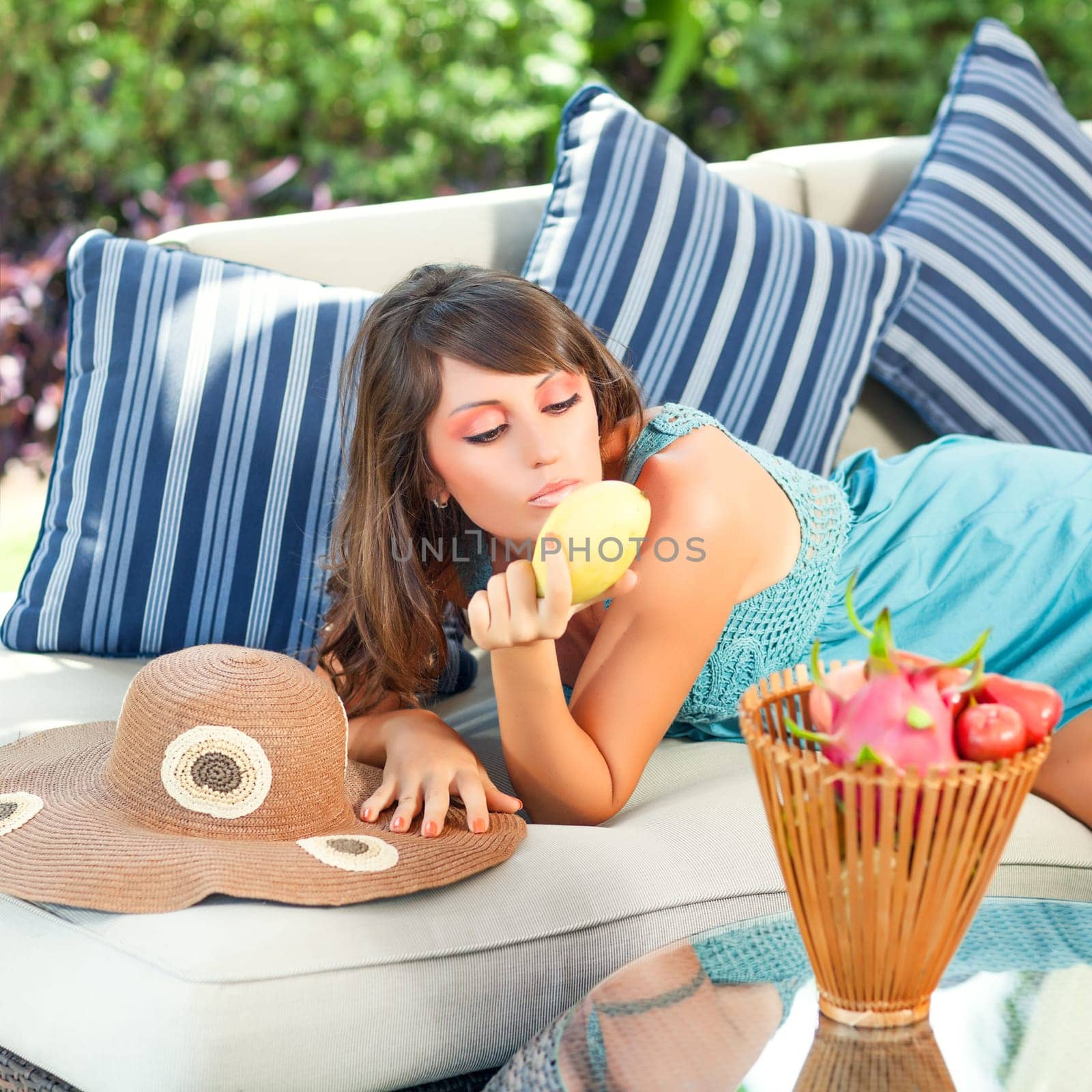 Beautiful woman with fruits outdoor