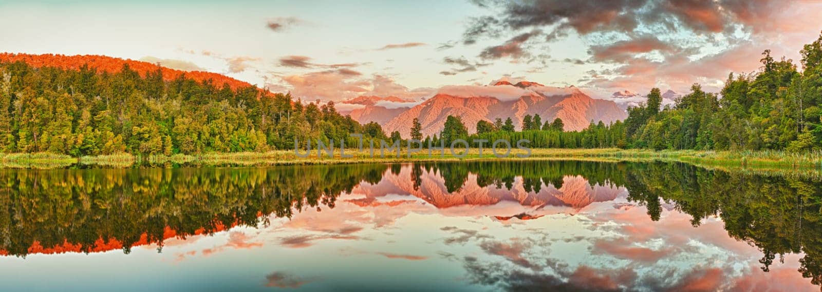 Reflection of the mountains in Matheson lake. Panorama