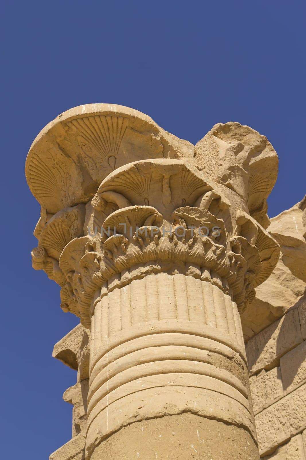 Detail of column (Temple of Kalabsha, Egypt). Blue sky in the background)